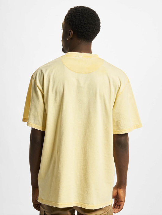 Männer t-shirts Karl Kani Herren T-Shirt Signature Destroyed in gelb