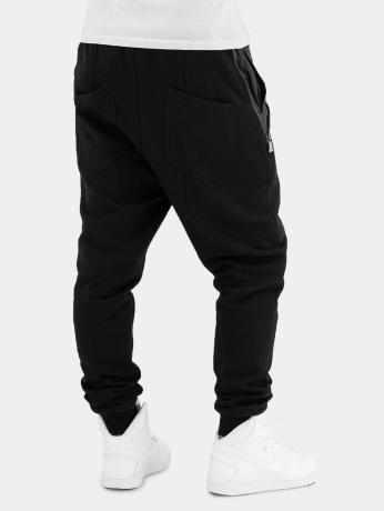 Urban Classics / joggingbroek Side Zip Leather Pocket in zwart