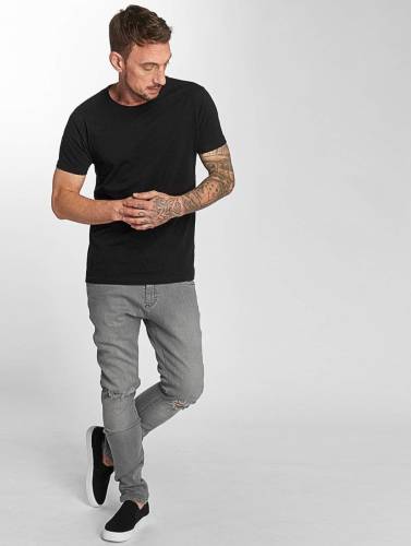 Urban Classics / Slim Fit Jeans Knee Cut in grijs