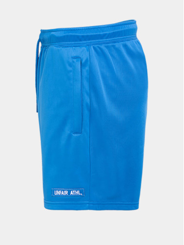 UNFAIR ATHLETICS / shorts DMWU Athletics in blauw
