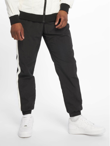 Urban Classics / joggingbroek Side Striped Crinkle in zwart