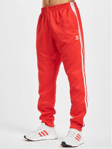adidas Originals / joggingbroek SST TP P Blue in rood