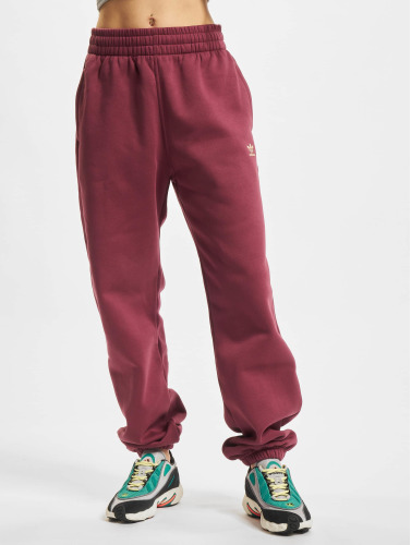 adidas Originals / joggingbroek Essentials Fleece in rood