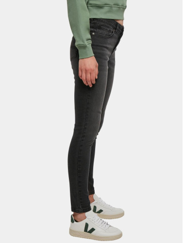 Urban Classics / Skinny jeans Ladies Mid Waist in zwart