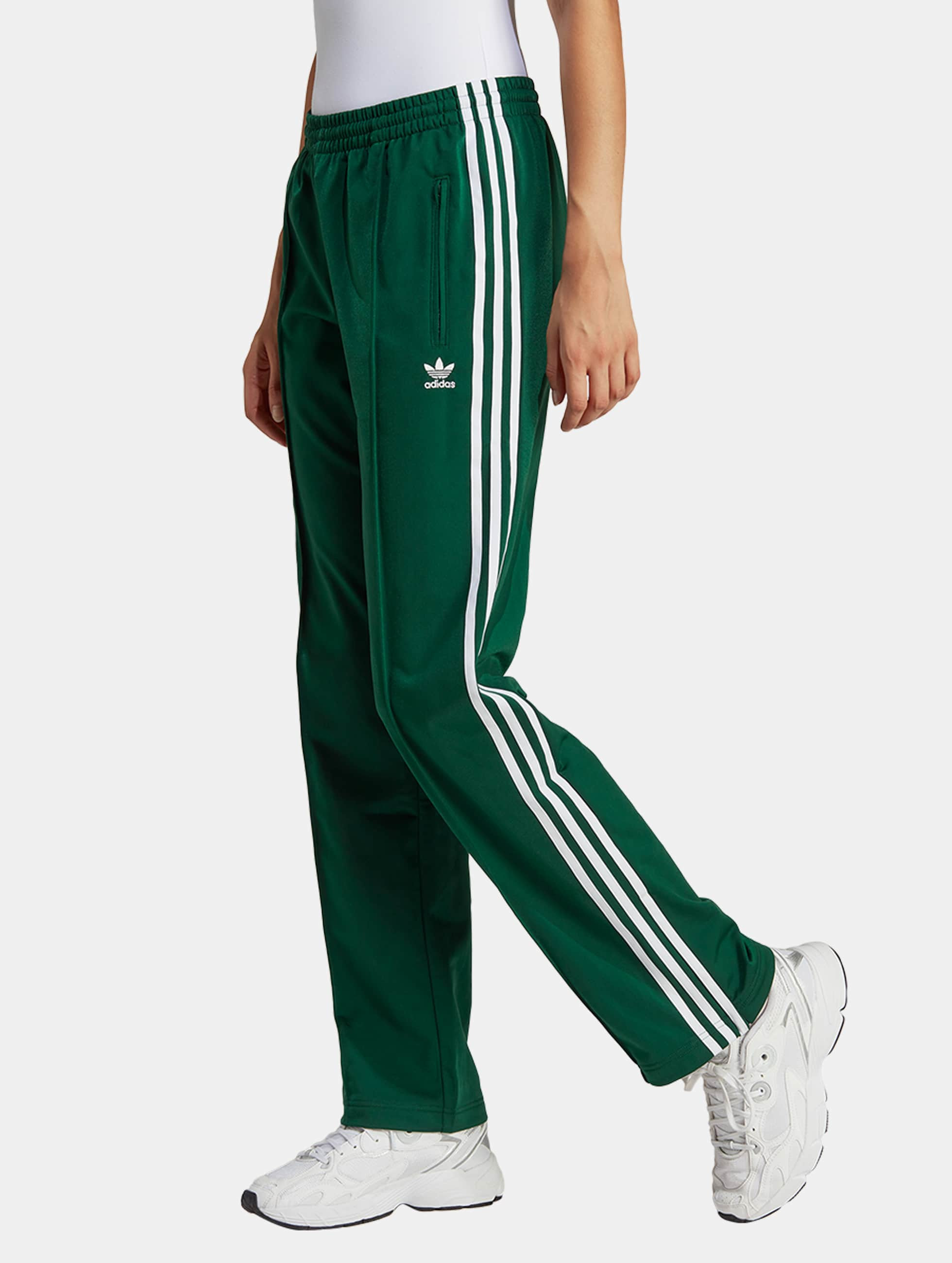 planter Monopoly leeuwerik adidas Originals broek / joggingbroek Firebird in groen 1048390