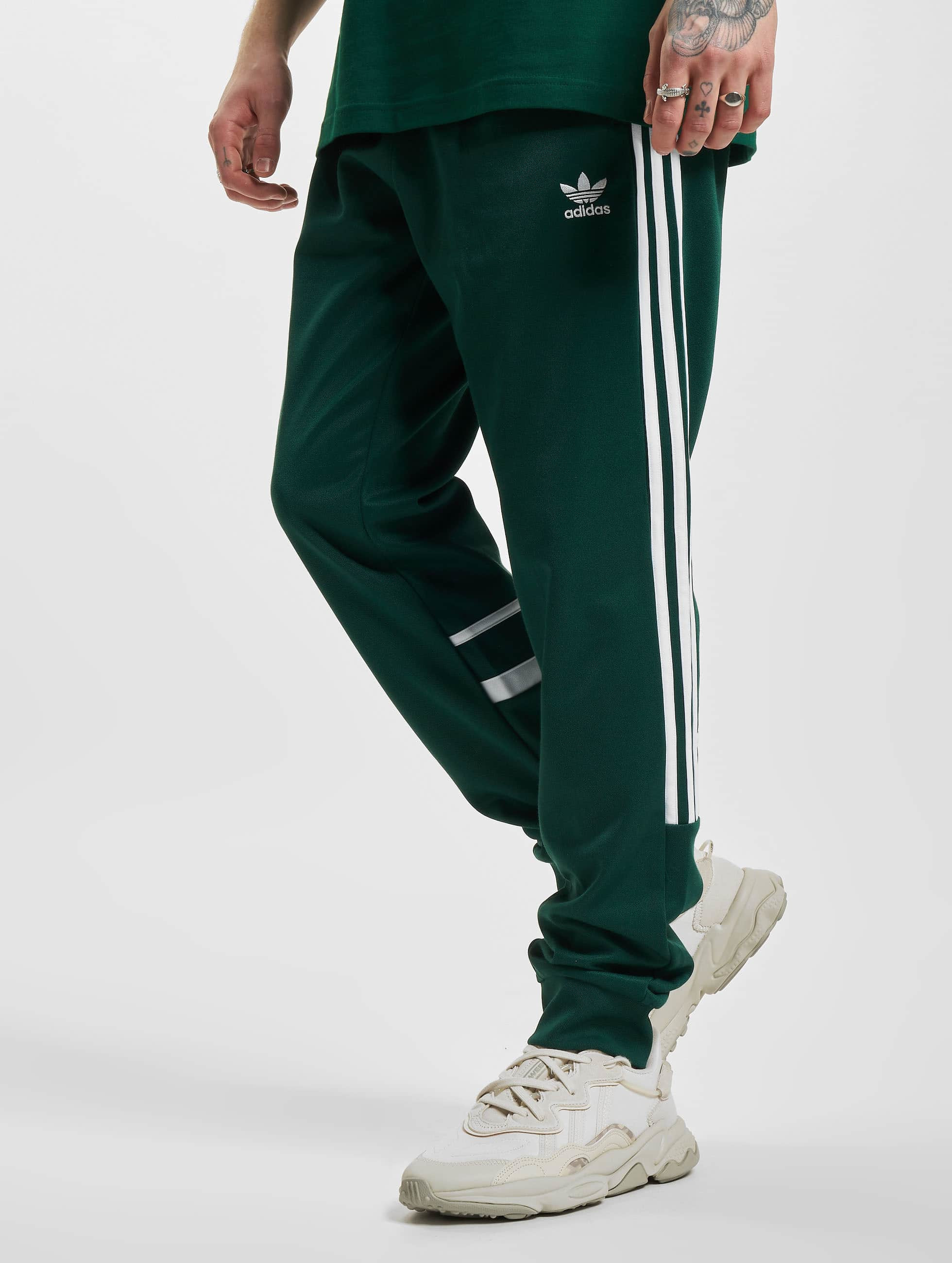 enthousiast Verenigde Staten van Amerika Prijs adidas Originals broek / joggingbroek Cutline in groen 987097