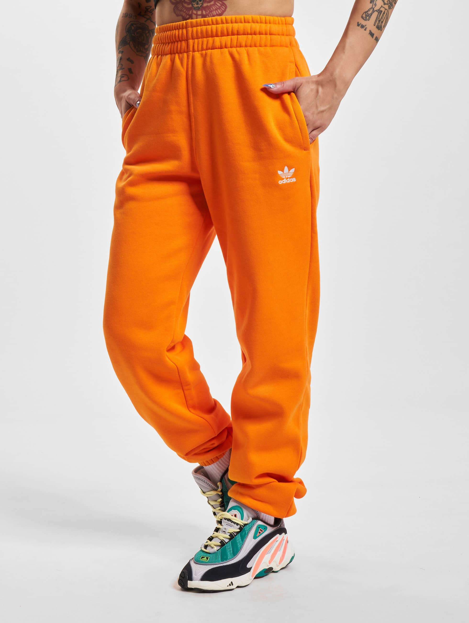 Durven verontreiniging Lief adidas Originals broek / joggingbroek Adicolor Essentials Fleece in oranje  891429