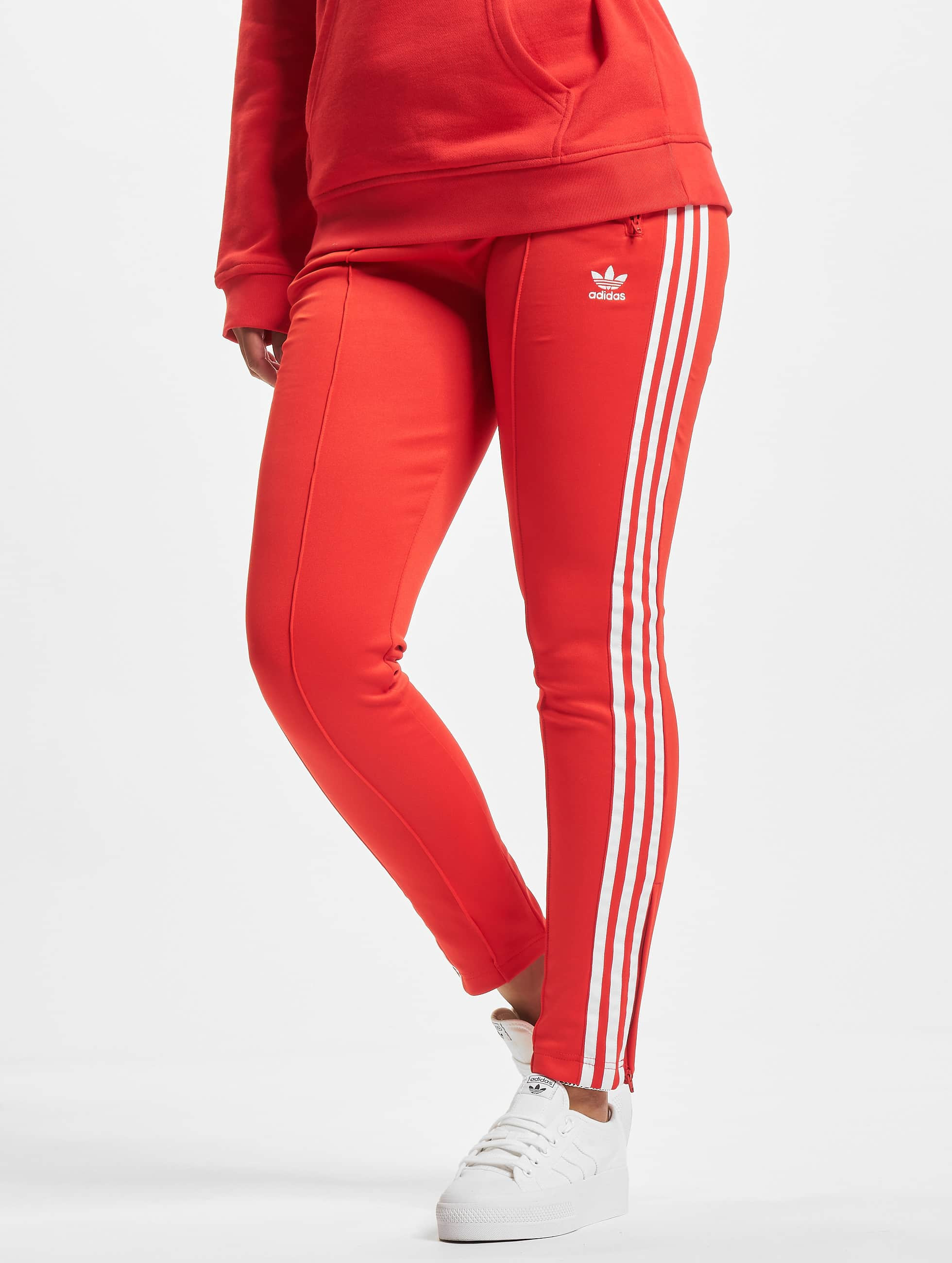 fama Nido Belicoso adidas Originals Pantalón / Pantalón deportivo SST en rojo 872936