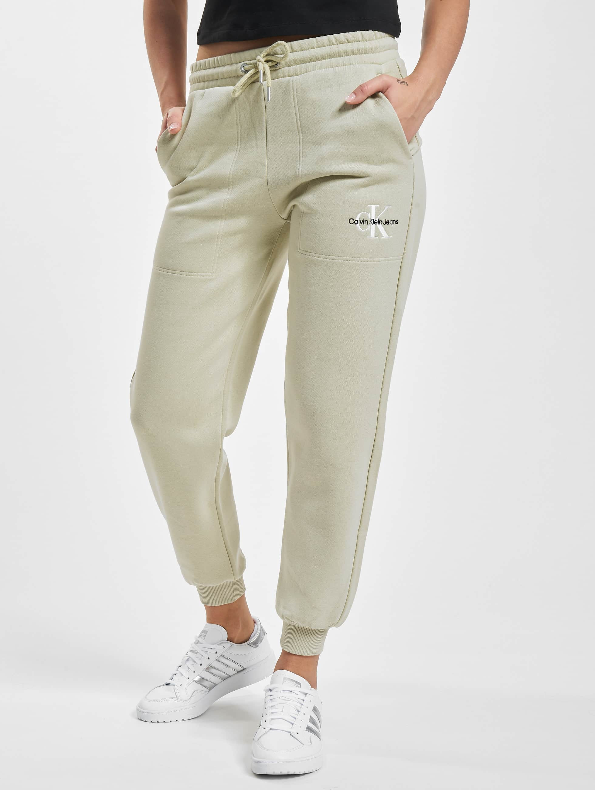 voorwoord Grof naam Calvin Klein Jeans broek / joggingbroek Monogram Cuffed in beige 970885