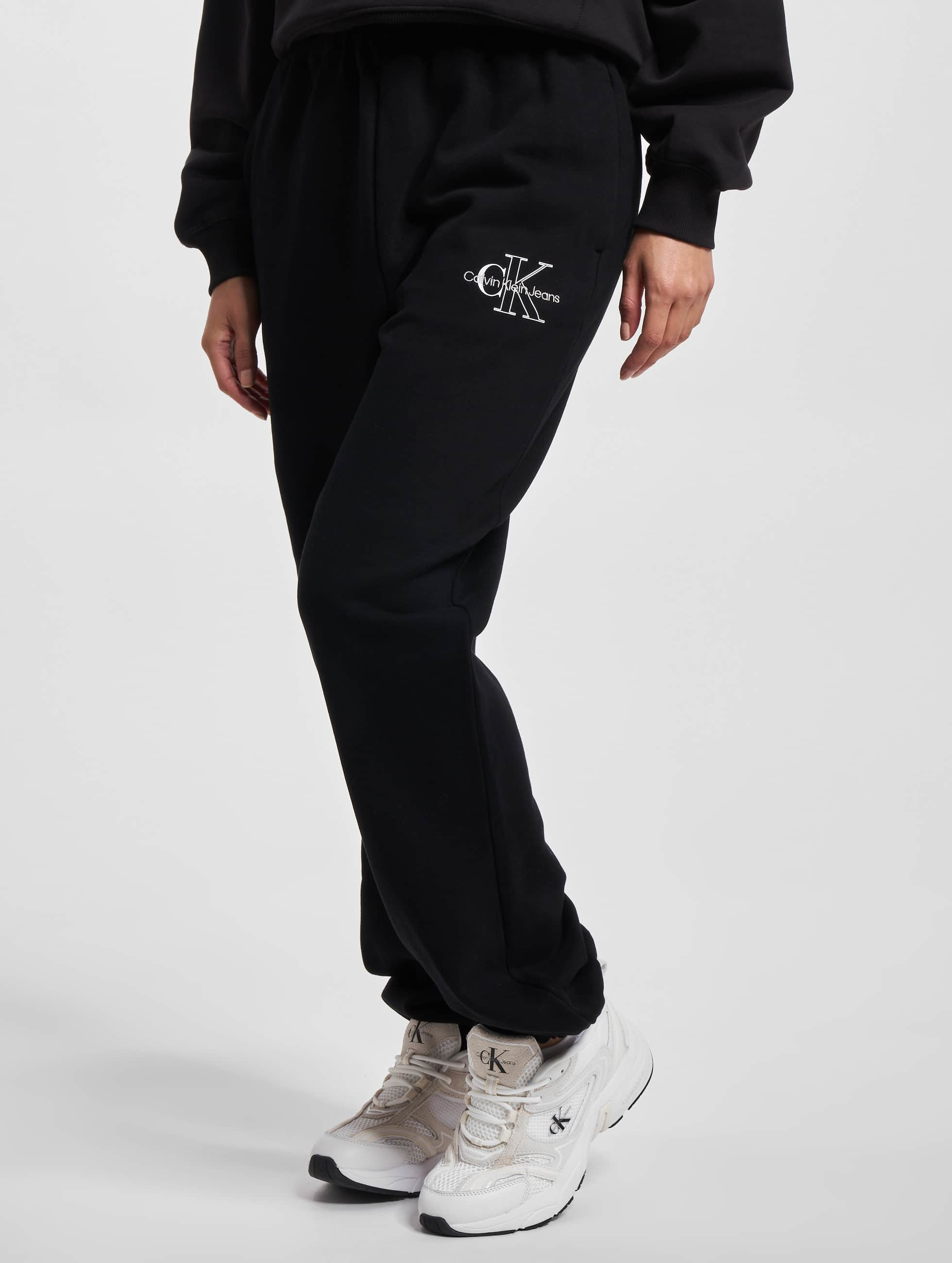 Mos Beide Onderbreking Calvin Klein broek / joggingbroek Two Tone Monogram in zwart 1031272