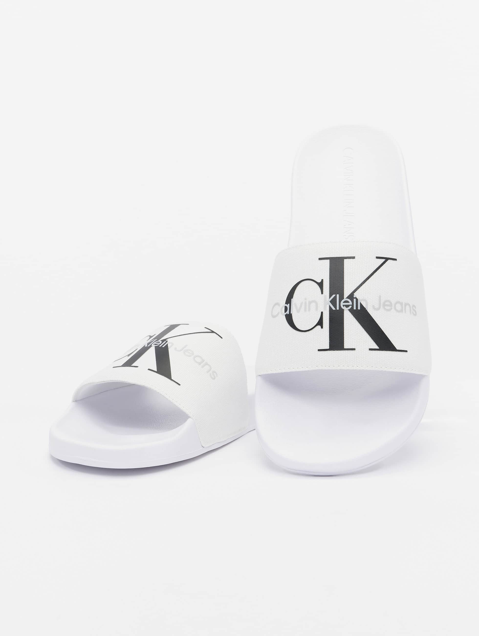 Oppervlakte Terugroepen Centrum Calvin Klein schoen / Slipper/Sandaal Monogram in wit 973110