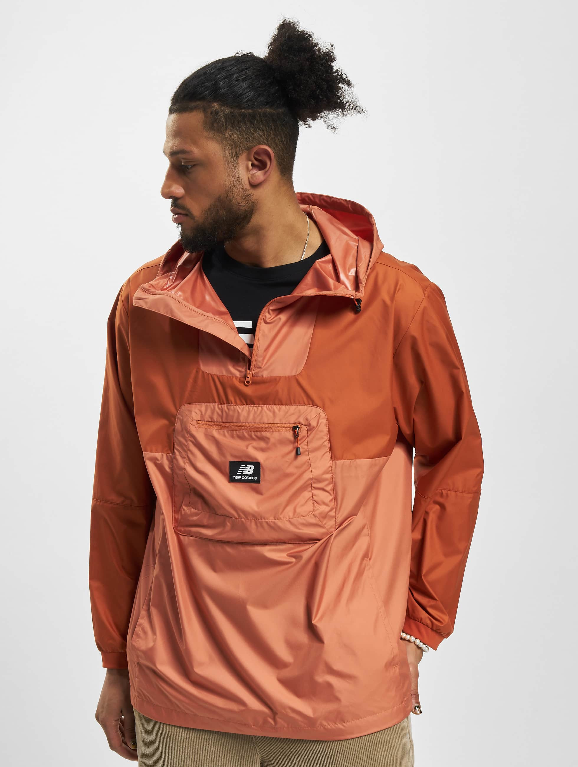 Heerlijk Plantkunde Beleefd New Balance Jacket / Lightweight Jacket All Terrain in orange 984182