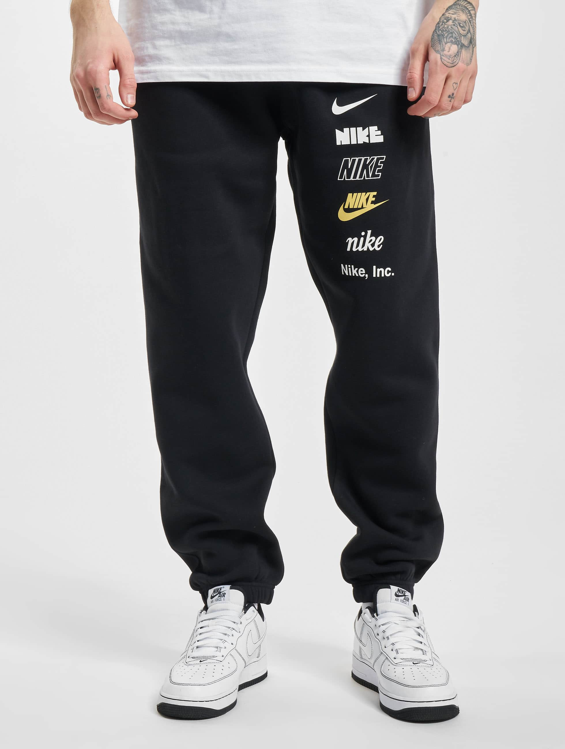 mordaz Realista vendaje Nike Pantalón / Pantalón deportivo Club Fleece Logo en negro 975254