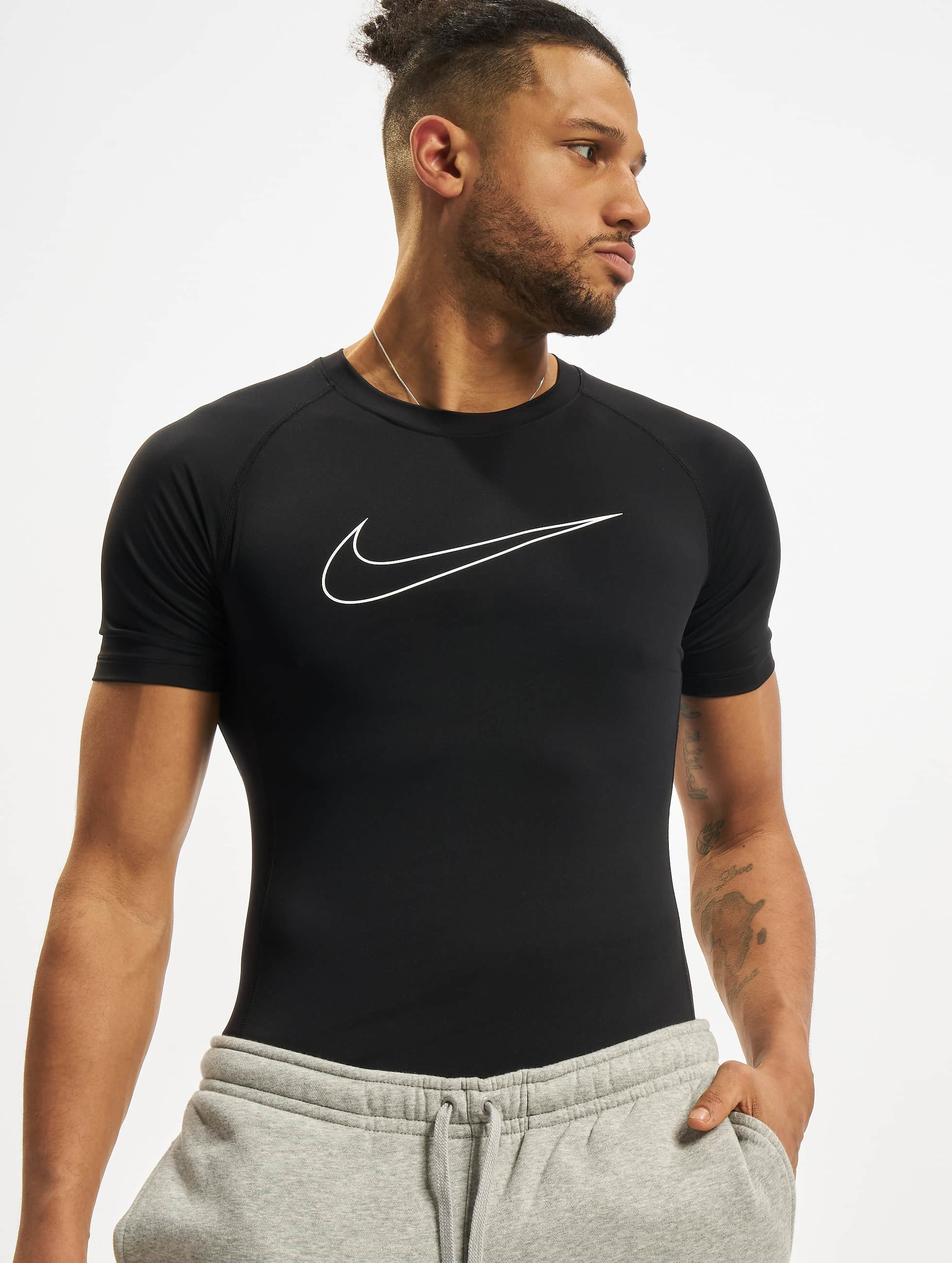 Belonend stereo Pakistan Nike Performance Overwear / T-Shirt Dri-Fit Tight Top in black 876727