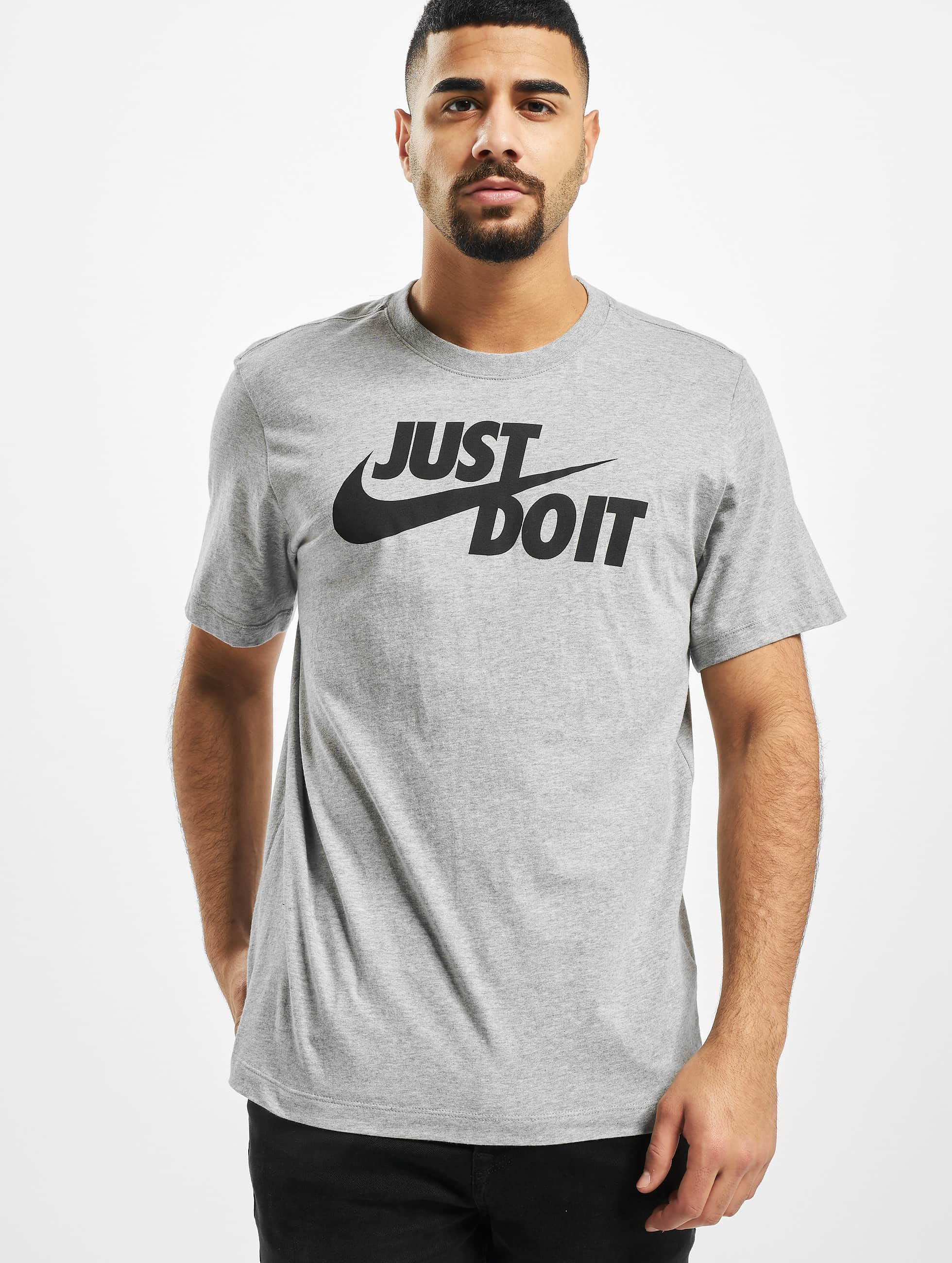 Wreed twee weken hoek Nike bovenstuk / t-shirt Just Do It Swoosh in grijs 737821