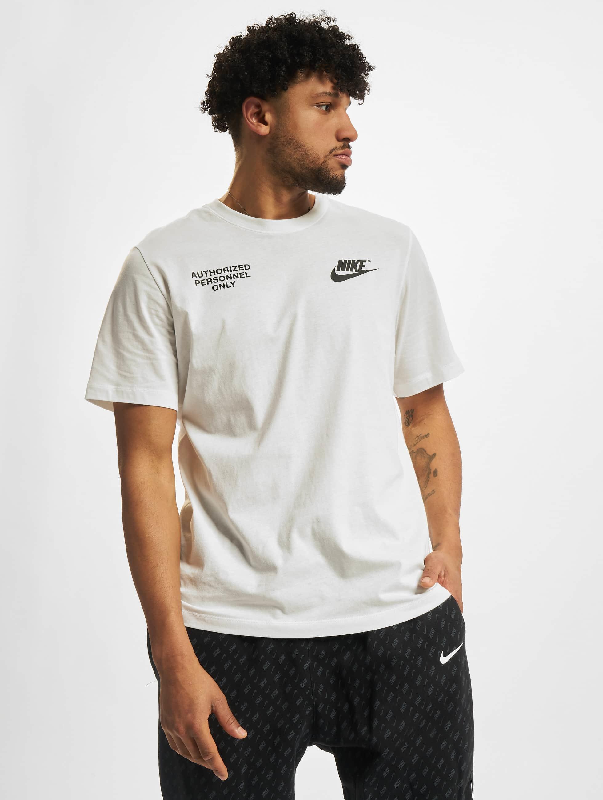 nike tech tops