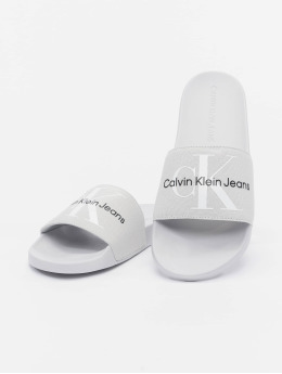Calvin Klein Claquettes & Sandales Monogram gris
