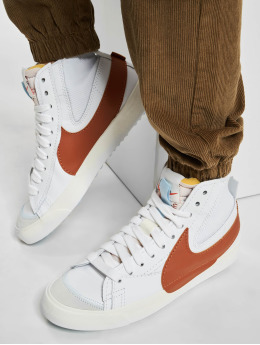 orange nike blazers low