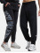 New Balance joggingbroek Athletics Warped Classics zwart