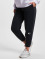 New Balance Joggingbyxor Essentials svart