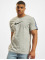 Nike T-paidat Repeat harmaa