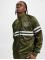 UNFAIR ATHLETICS Veste mi-saison légère DMWU Tracktop olive
