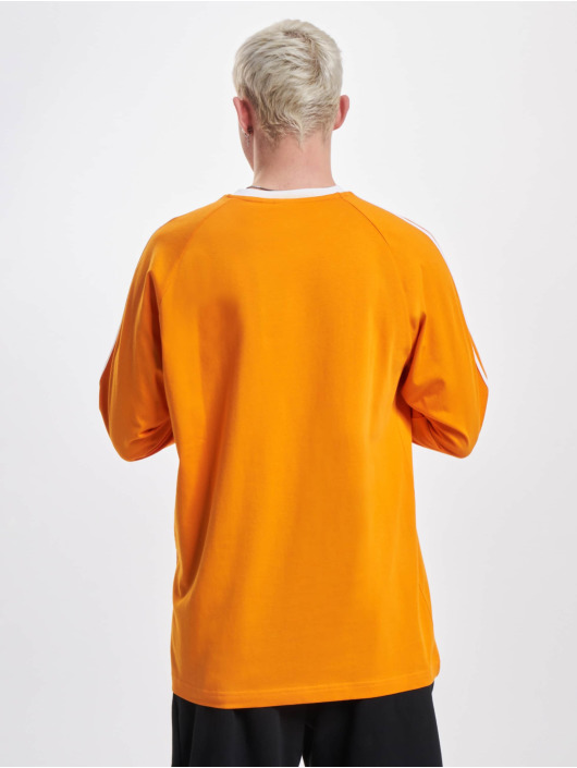 compromiso infinito Apariencia adidas Originals Ropa superiór / Camiseta de manga larga 3 Stripes en  naranja 1006830