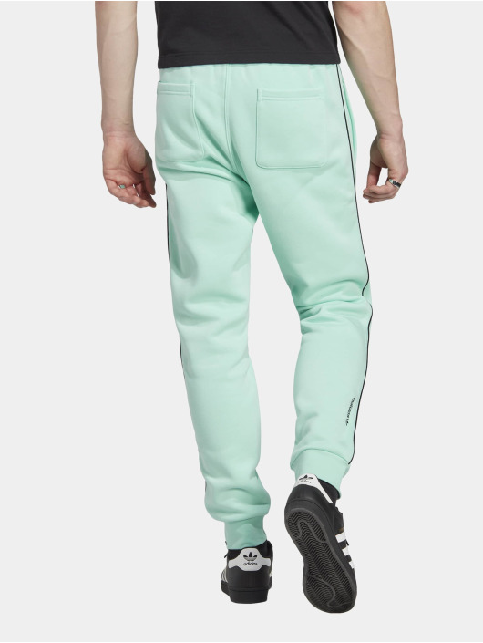 noot Voorbereiding bijzonder adidas Originals broek / joggingbroek C in groen 1007187