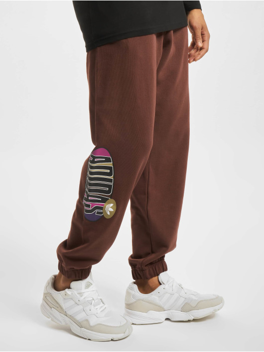 adidas Originals Spodnie do joggingu TRF A33 brazowy