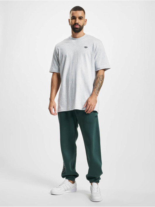 adidas Originals Spodnie do joggingu Varsity zielony