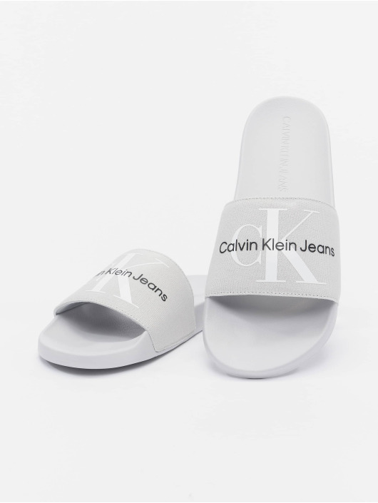 Calvin Klein Sko Badesko/sandaler Monogram i grå 973100