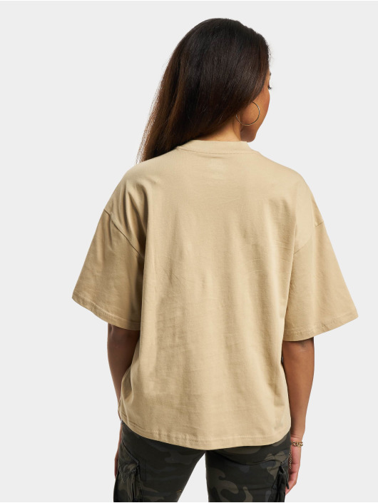New Balance Camiseta Athletics 70s Run Graphic beis