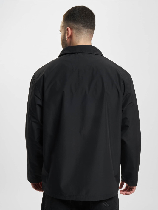 New Balance Chaqueta de entretiempo Essentials negro