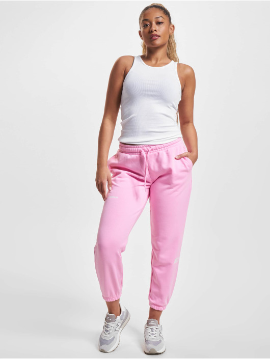 New Balance Jogging kalhoty Essentials růžový
