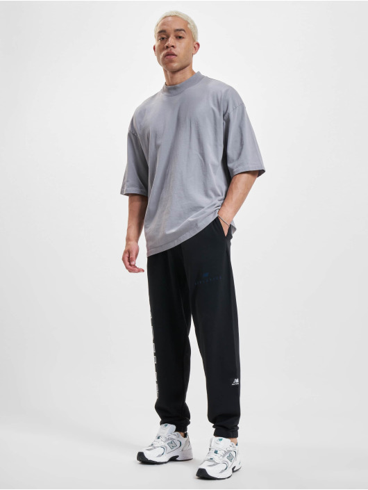 New Balance Jogging kalhoty Athletics Warped Classics New čern