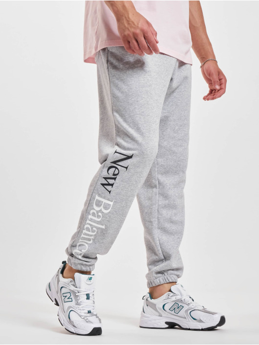 New Balance Jogging kalhoty Essentials Celebrate New šedá
