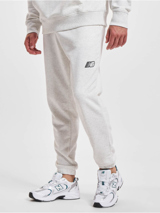 New Balance Jogging kalhoty Essentials šedá