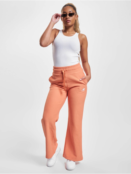 New Balance Joggingbyxor Athletics färgad