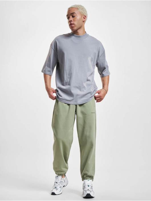 New Balance Joggingbyxor Athletics Nature State New oliv
