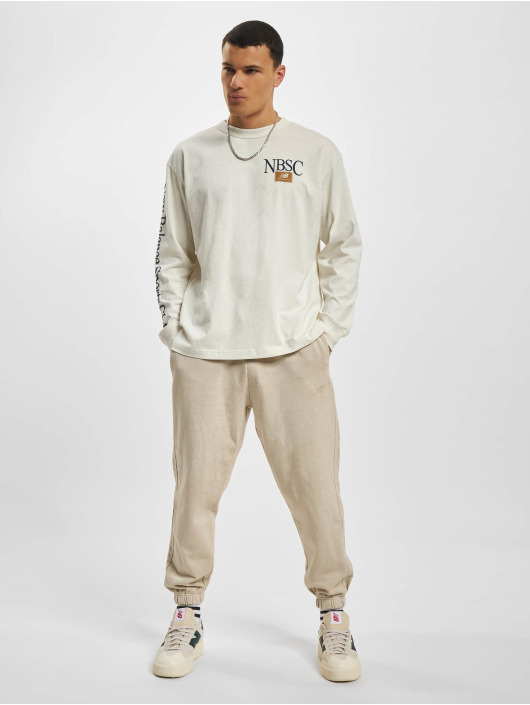 New Balance Maglietta a manica lunga Athletics Sports Club bianco