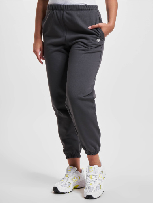 New Balance Pantalón deportivo Athletics Fleece beis