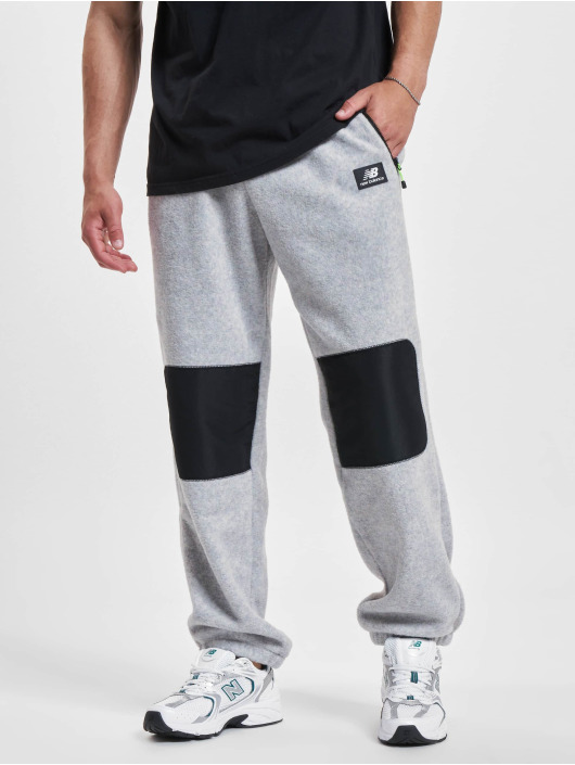 New Balance Pantalón deportivo At Spinnex gris