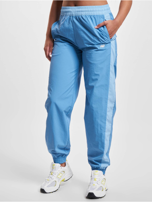 New Balance Verryttelyhousut Athletics Woven sininen