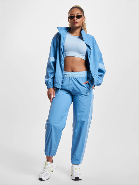 New Balance Verryttelyhousut Athletics Woven sininen