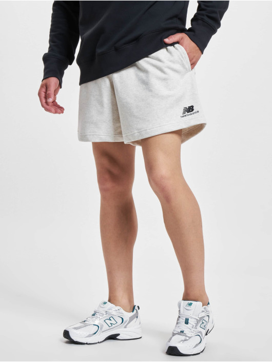 New Balance Šortky Essentials Uni-Ssentials New béžový