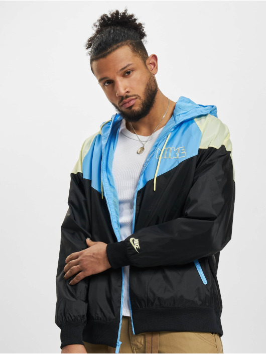 Nike Bundy na přechodné roční období Windbreaker modrý