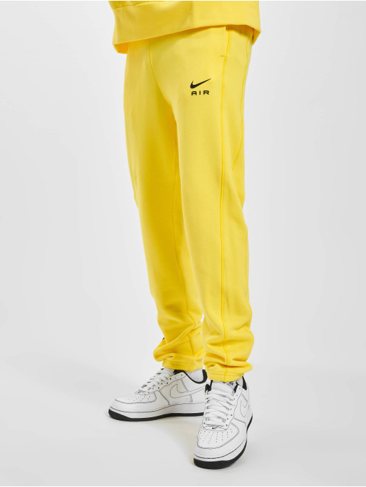 Verschuiving Midden Conciërge Nike broek / joggingbroek Air in geel 974876