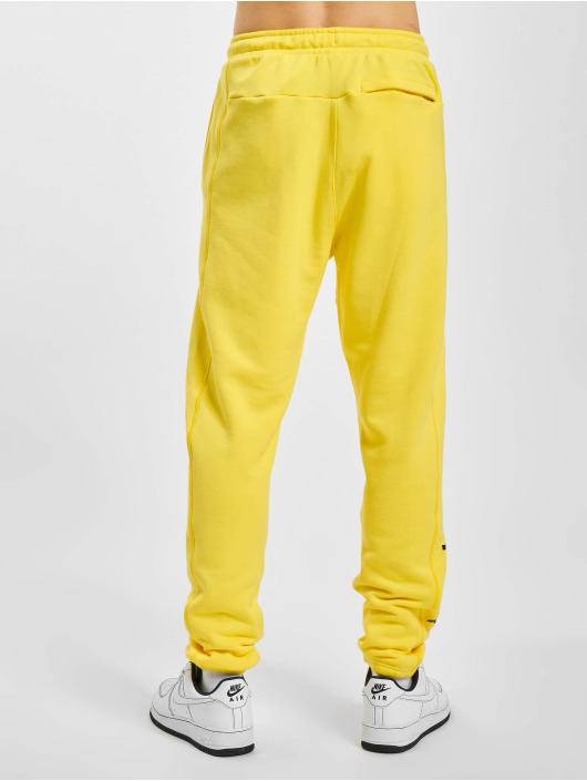 Verschuiving Midden Conciërge Nike broek / joggingbroek Air in geel 974876