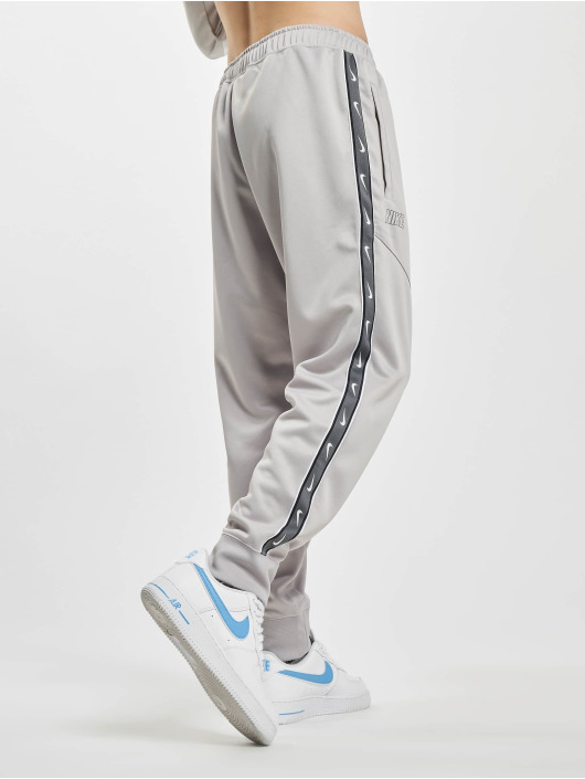 Nike joggingbroek Sportswear Repeat grijs