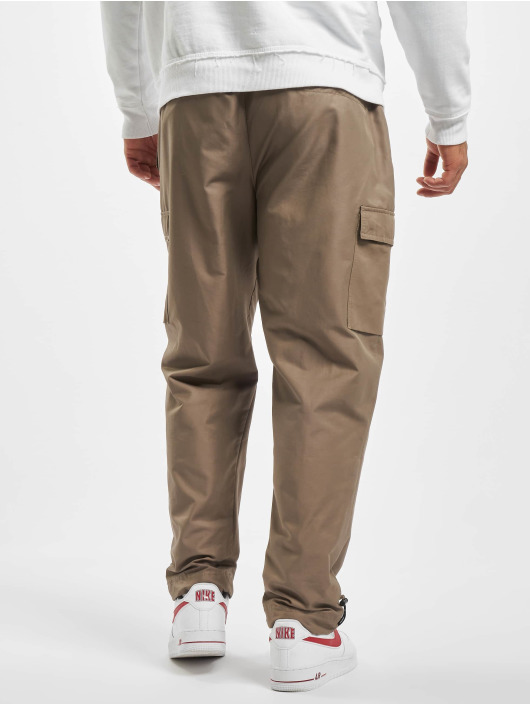 nike woven players jogger pants